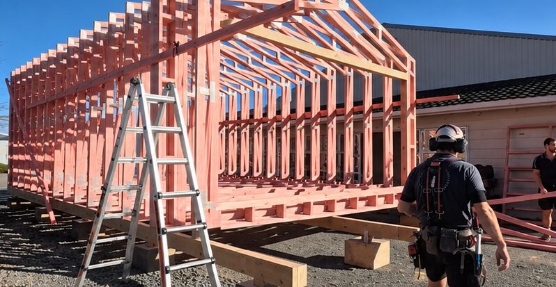 Modtruss timber truss frame being assembled on a raised timber floor